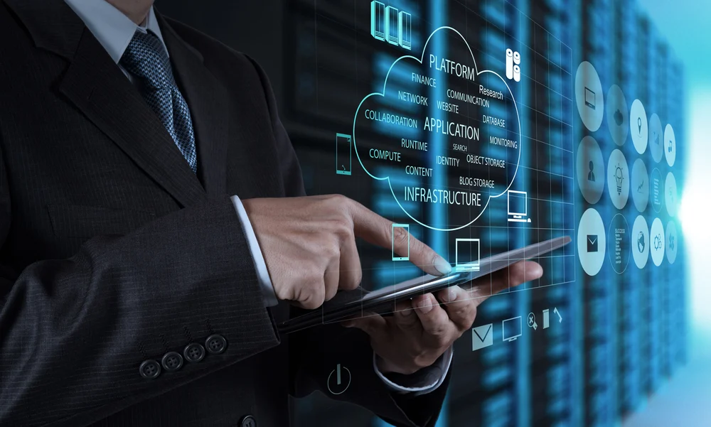 businessman hand using tablet computer and server room background businessman hand using tablet computer and server room background
